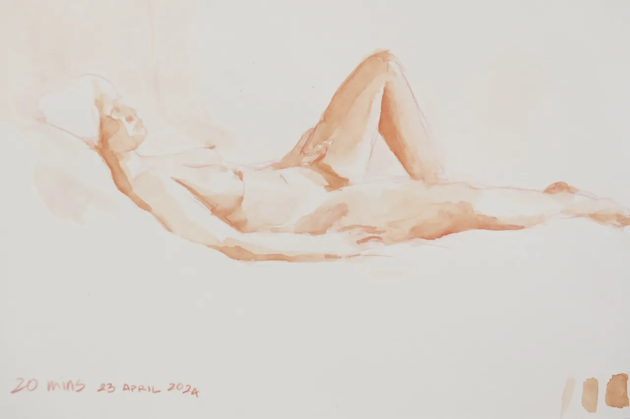 watercolour sketch of a nude woman, lying down