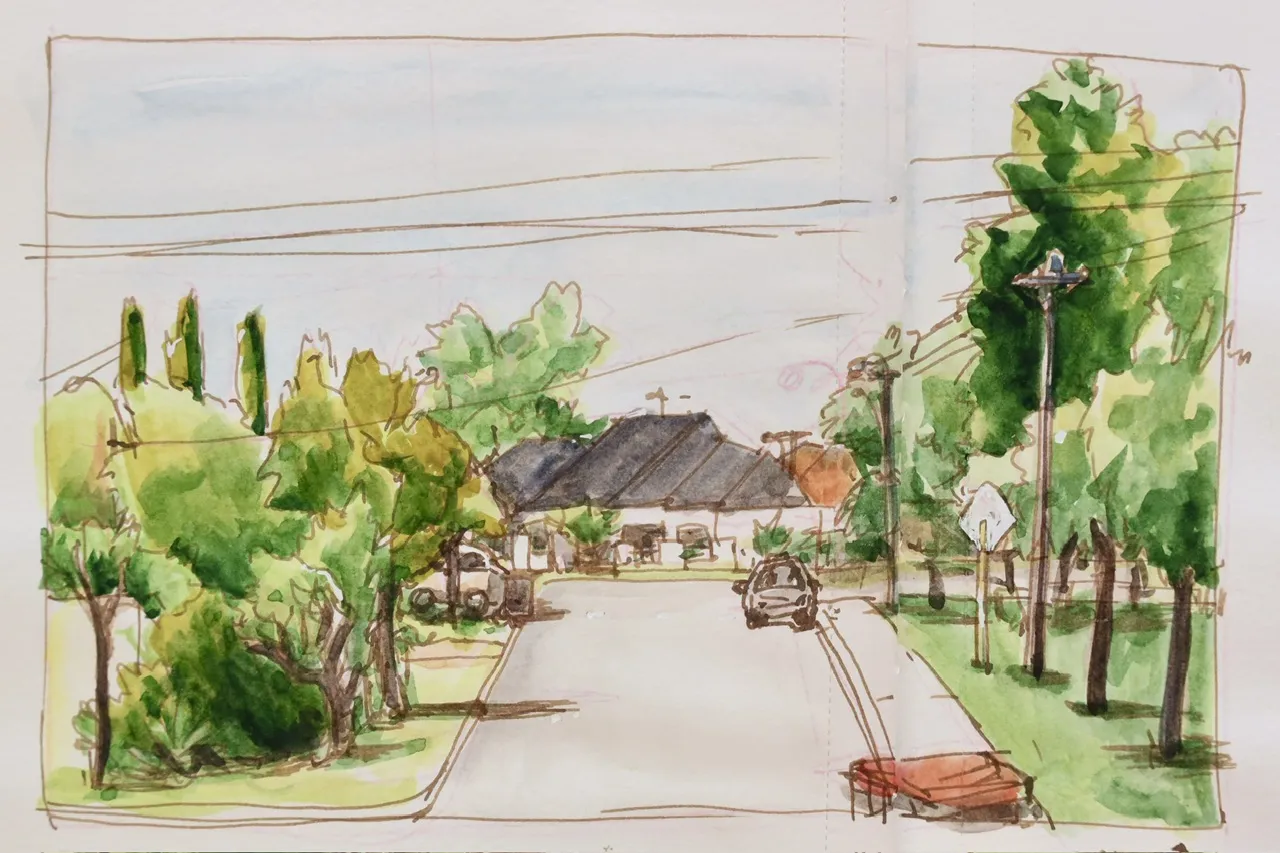 ink and watercolour sketch of a street with trees