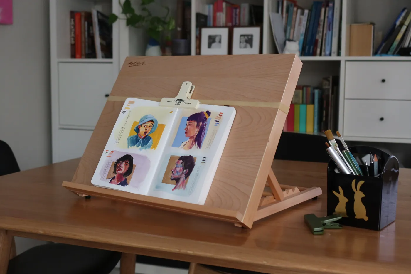 photo of my dining table with an A3 sized drawing board on it holding a sketchbook
