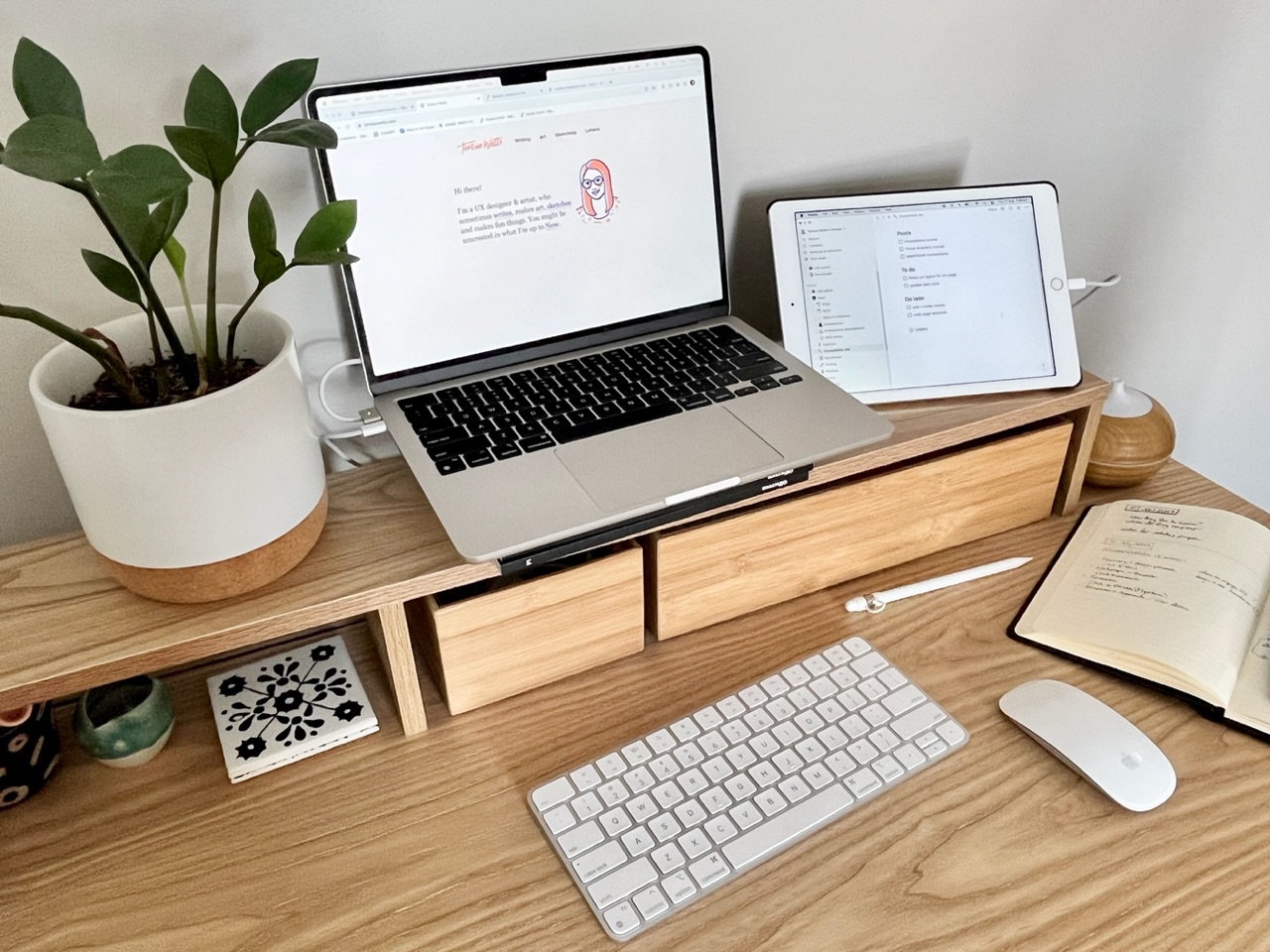 photo of my desk, with my iPad hooked up to my laptop