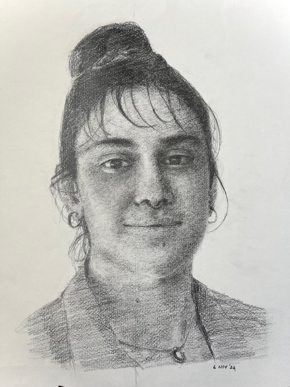 IMG_3572.jpeg|pencil portrait showing the oversharpening