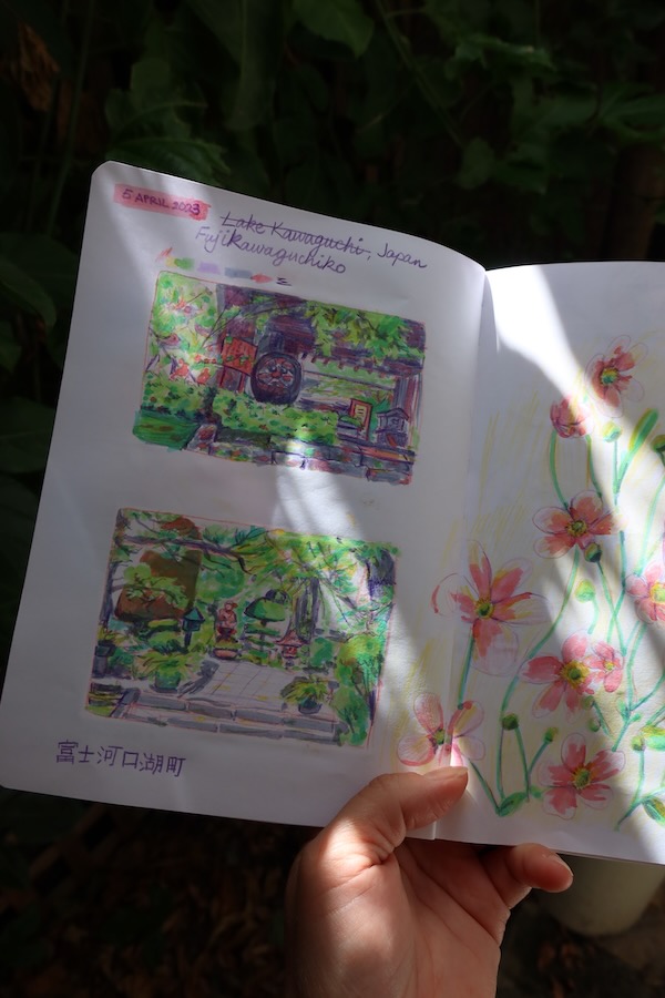 Photo of a sketchbook page - highlighter sketches from a garden in Japan