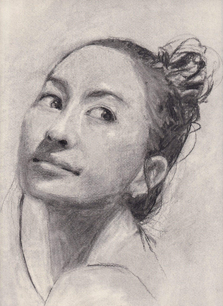 steph-art-sessions 2.jpeg|charcoal portrait of a woman looking over her shoulder